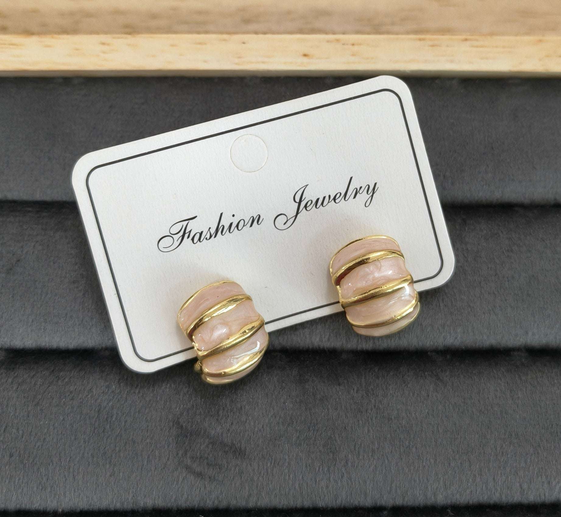 Fancy Anitarnish Soft Pink Golden Toned Enamel Earrings