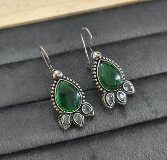 German Silver Toned Emerald Stone Studded Earrings