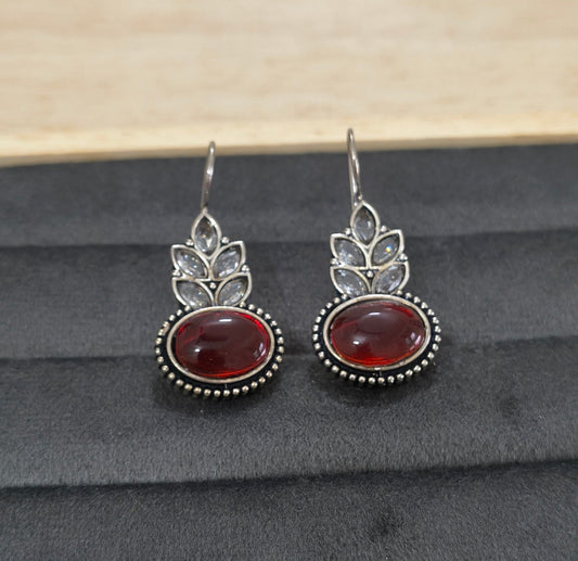 German Silver Toned Red Colored Stone Studded Earrings