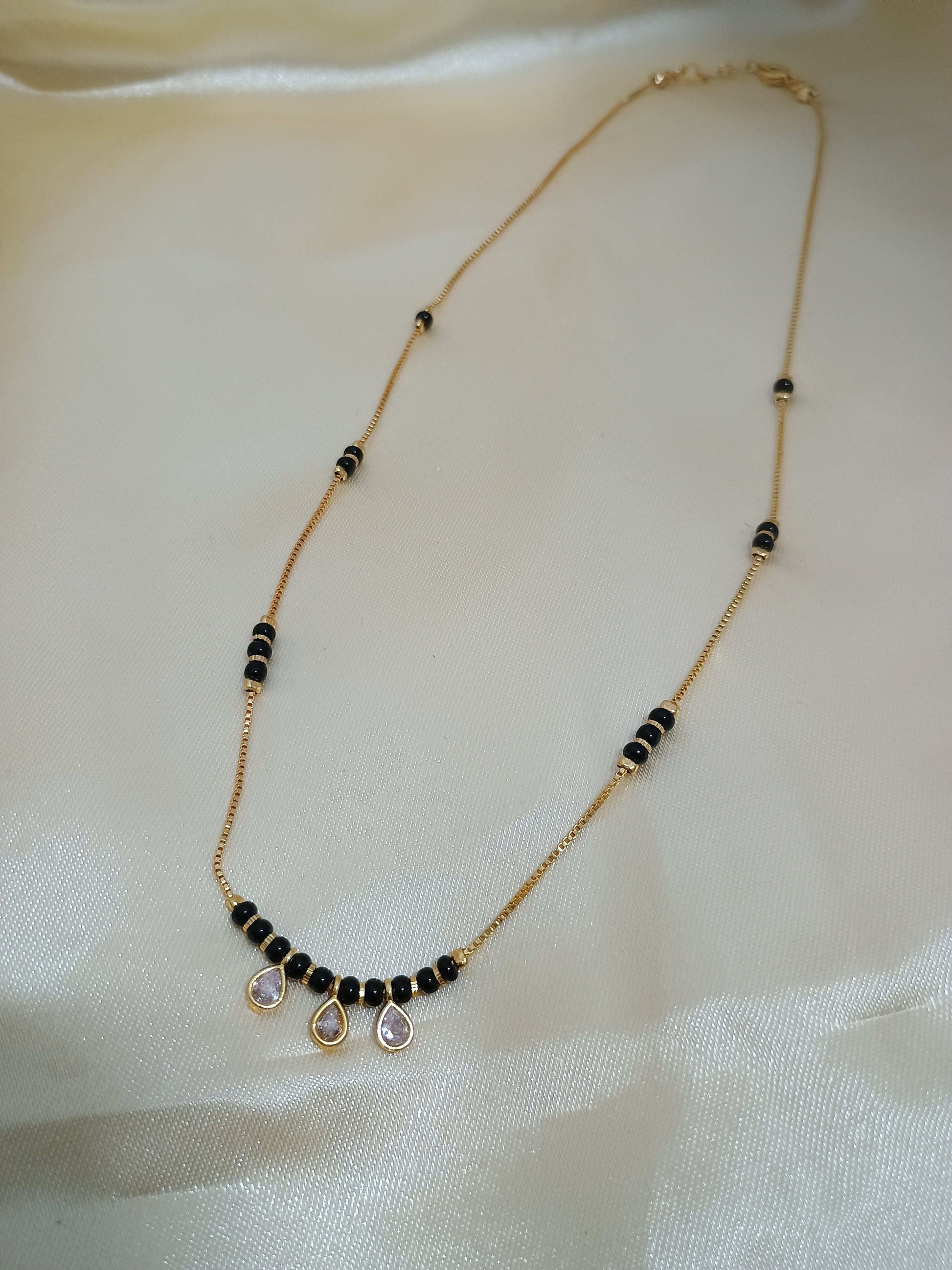 Gold Plated Trendy Mangalsutra Chain With Sparkling Stones