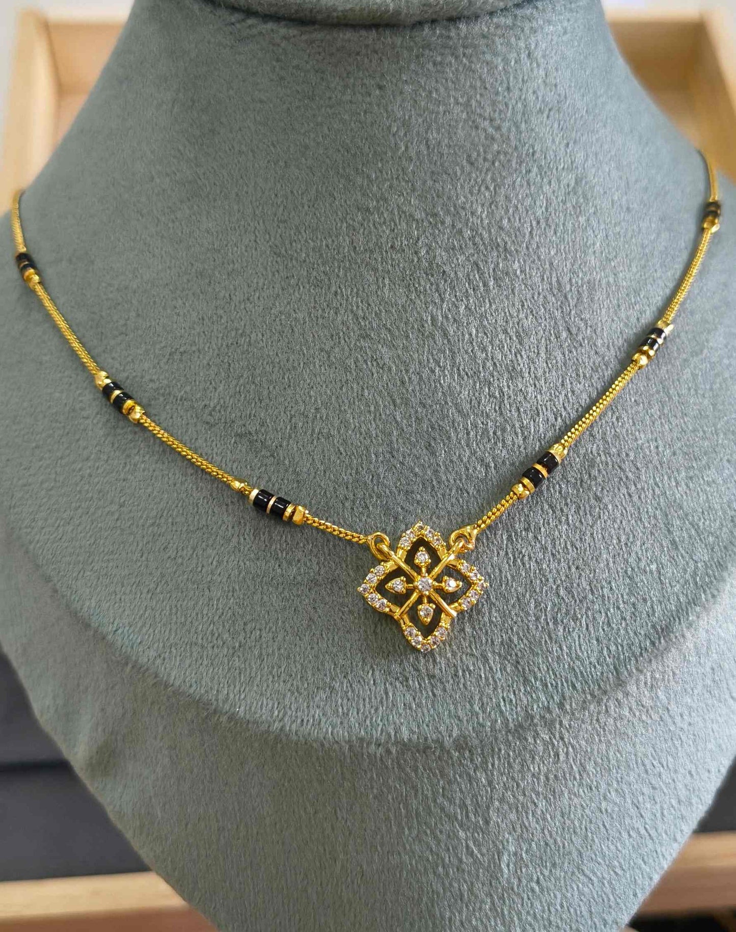 Daily Wear Mangalsutra Black Beaded AD Flower Pendant