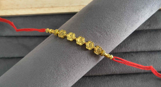Premium Designer Golden Om Charms Rakhi for Brother
