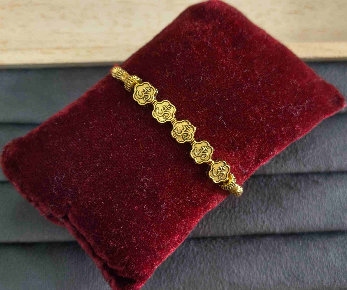 Premium Designer Golden Om Charms Rakhi for Brother