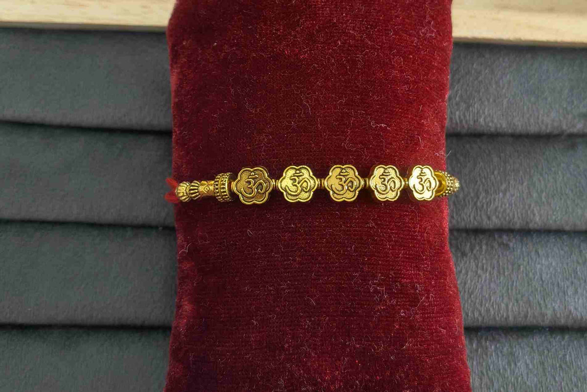 Premium Designer Golden Om Charms Rakhi for Brother