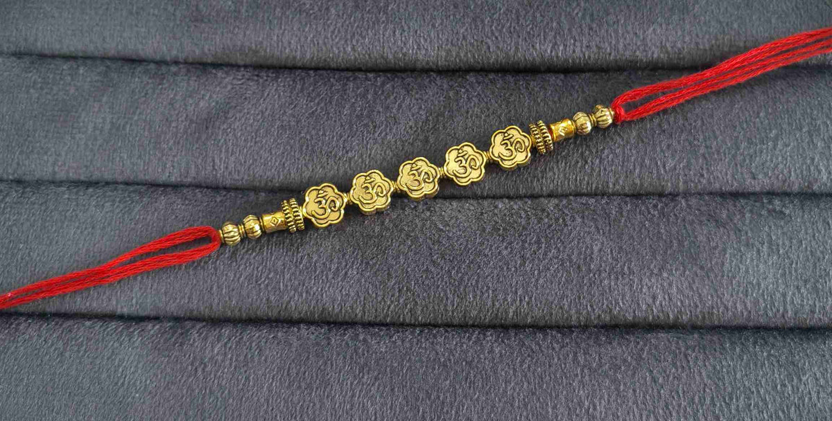 Premium Designer Golden Om Charms Rakhi for Brother