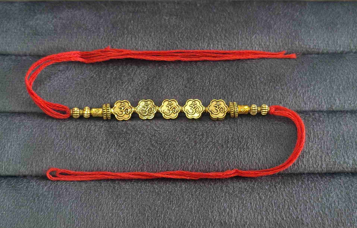 Premium Designer Golden Om Charms Rakhi for Brother