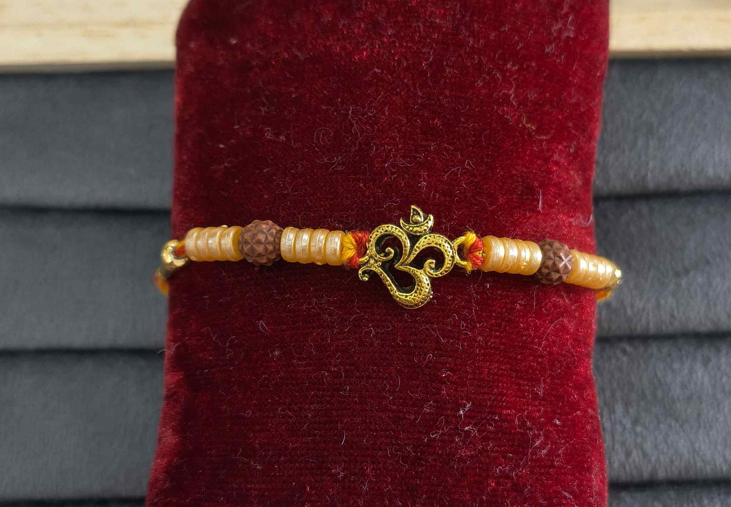 Premium Divine Om Rakhi with Pearl Beads for Brother