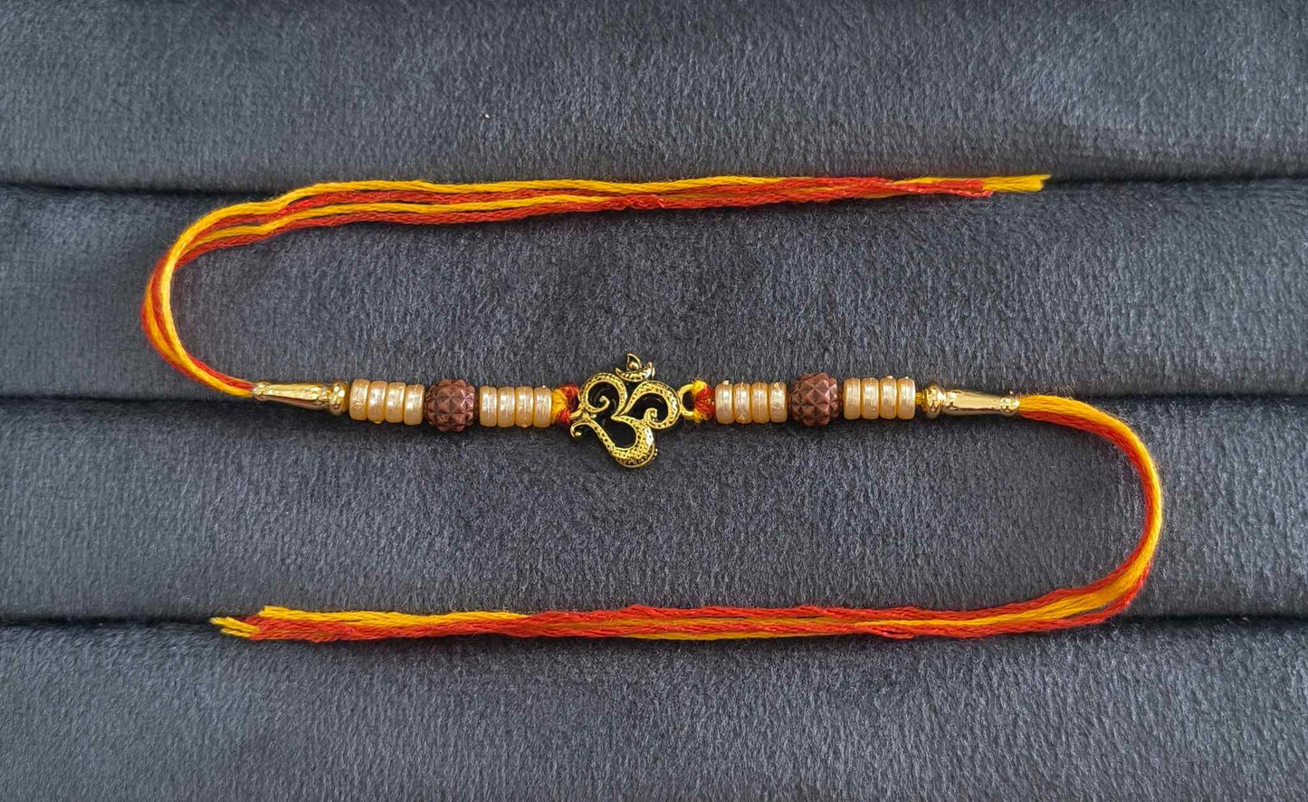 Premium Divine Om Rakhi with Pearl Beads for Brother