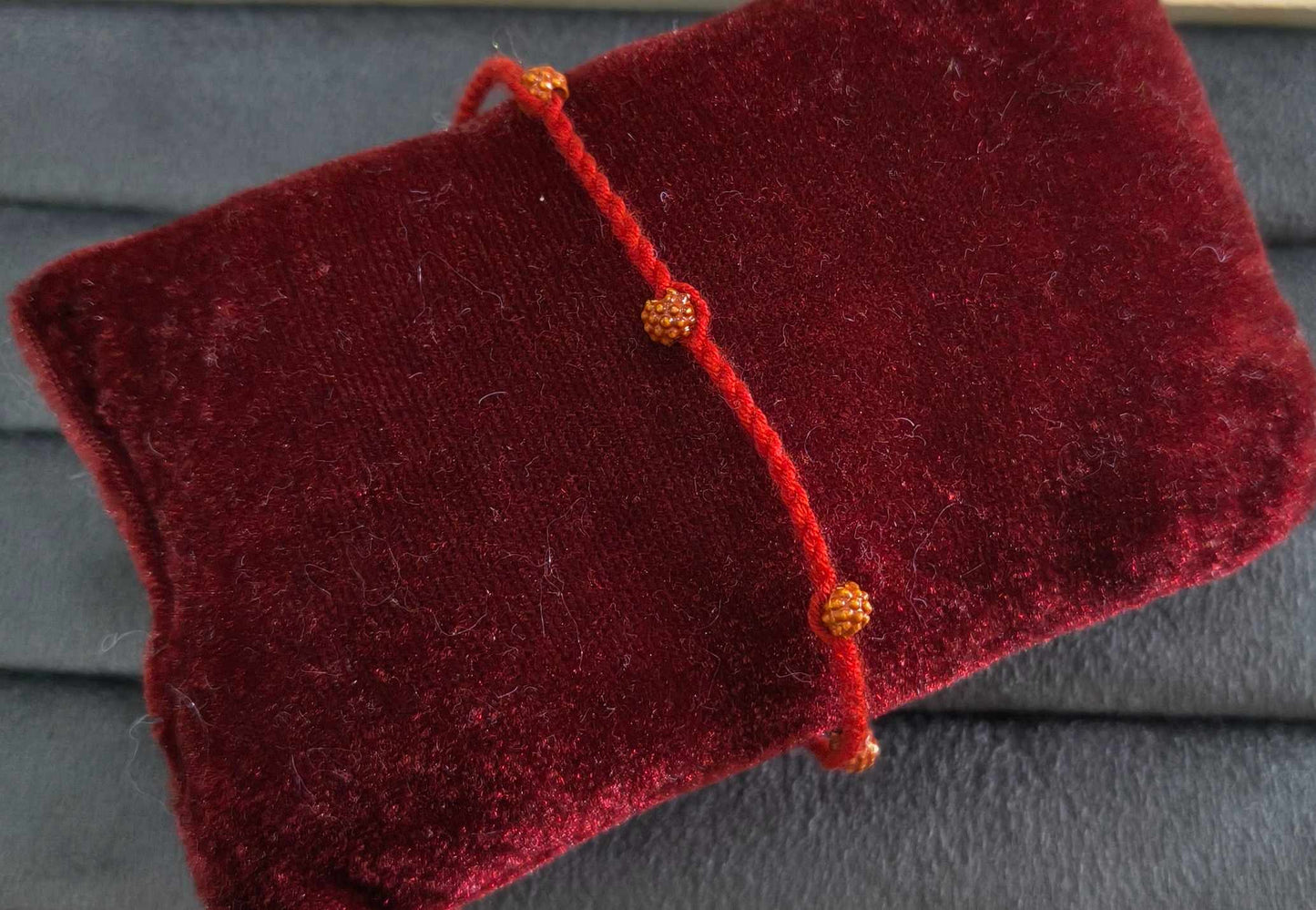 Premium Handcrafted Red Yellow Thread Rakhi for Brother