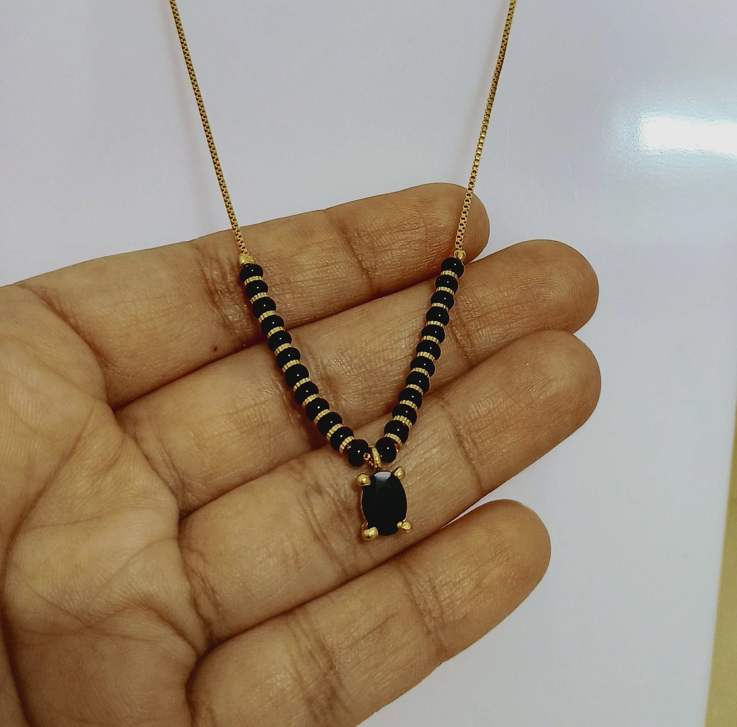 Trendy Mangalsutra Chain With Black Stone Gold Plated