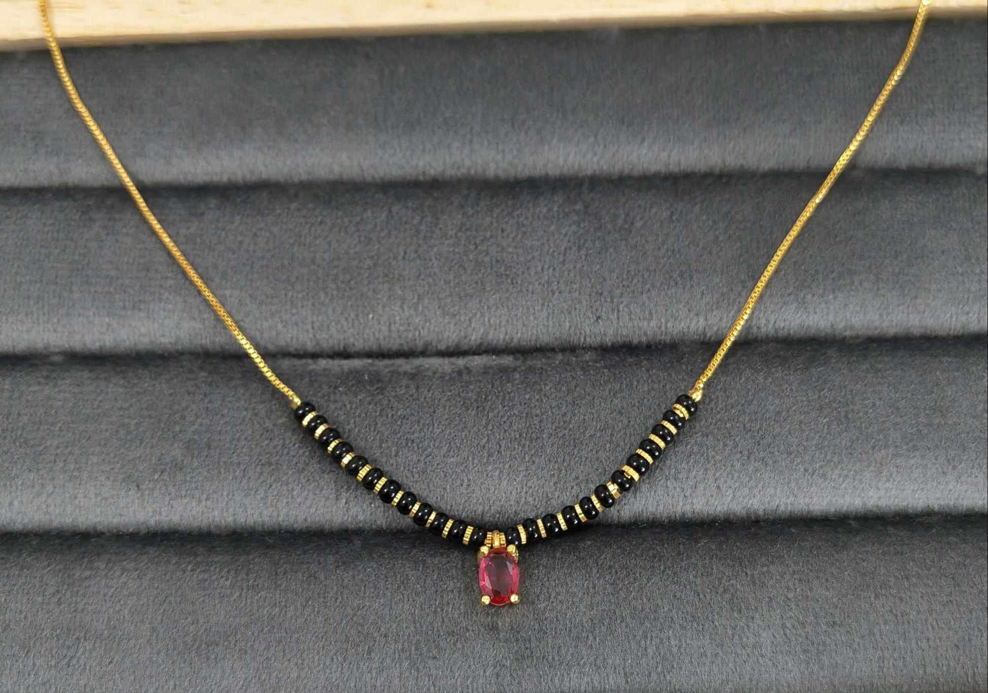 Trendy Mangalsutra Chain With Pink Stone Gold Plated