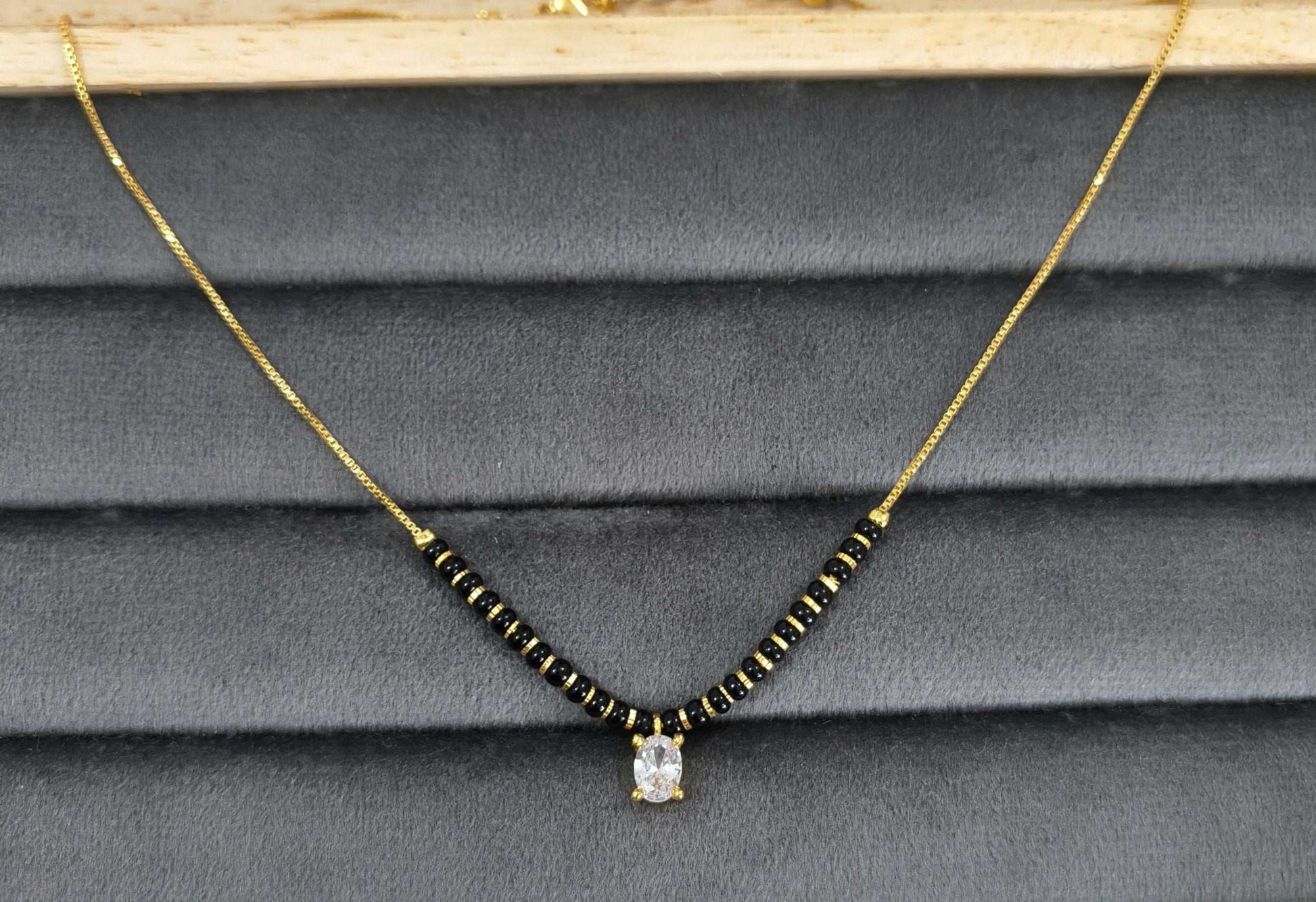 Trendy Mangalsutra Chain With White Stone Gold Plated